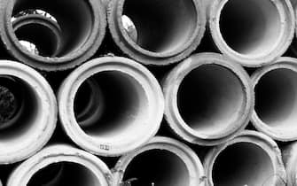 Close-up of asbestos pipes.