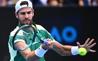 epa11088642 Karen Khachanov of Russia in action during his 3rd round match against Tomas Machac of the Czech Republic on Day 6 of the 2024 Australian Open at Melbourne Park in 
Melbourne, Australia, 19 January 2024.  EPA/JOEL CARRETT AUSTRALIA AND NEW ZEALAND OUT