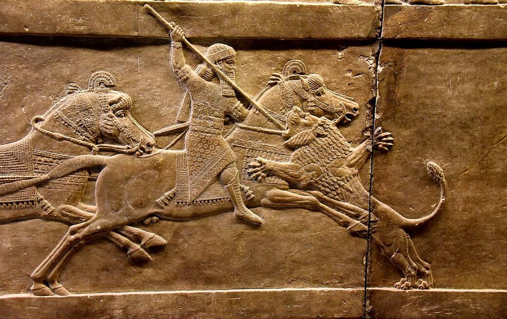 Assyrian-king-Ashurbanipal-on-his-horse-thrusting-a-spear-onto-a-lion’s-head-645-635-BCE-British-Museum-in-London.jpg