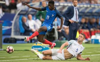 Ousmane Dembele of France competes with Gary Cahill of England during the international friendly match between France and England at the Stade de France on June 13, 2017 in Saint-Denis, FRANCE. France won England with 3-2.
 (Photo by Xinhua/Sipa USA)
