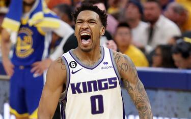 SAN FRANCISCO, CALIFORNIA - APRIL 28: Malik Monk #0 of the Sacramento Kings reacts after making a basket in the second half Game Six of the Western Conference First Round Playoffs against the Golden State Warriors at Chase Center on April 28, 2023 in San Francisco, California. NOTE TO USER: User expressly acknowledges and agrees that, by downloading and or using this photograph, User is consenting to the terms and conditions of the Getty Images License Agreement. (Photo by Ezra Shaw/Getty Images)