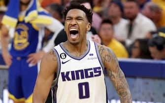 SAN FRANCISCO, CALIFORNIA - APRIL 28: Malik Monk #0 of the Sacramento Kings reacts after making a basket in the second half Game Six of the Western Conference First Round Playoffs against the Golden State Warriors at Chase Center on April 28, 2023 in San Francisco, California. NOTE TO USER: User expressly acknowledges and agrees that, by downloading and or using this photograph, User is consenting to the terms and conditions of the Getty Images License Agreement. (Photo by Ezra Shaw/Getty Images)