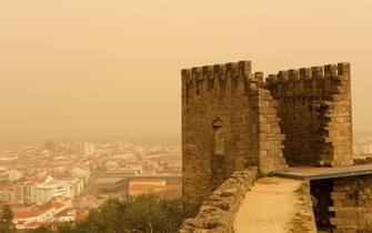 Castelo Branco, Portugal - March 15 2022: Saharan dust know as Clay Rain, blankets the town of Castleo Branco in Portugal