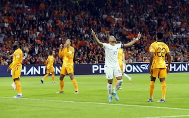 10/13/2023 - AMSTERDAM - Kylian Mbappe of France (10) celebrates the 0-1. (l-r) Lutsharel Geertruida of Holland, Virgil van Dijk of Holland, Kylian Mbappe of France, Denzel Dumfries of Holland during the European Championship Qualifying match in group B between the Netherlands and France at the Johan Cruijff ArenA on October 13, 2023 in Amsterdam, Netherlands. ANP KOEN VAN WEEL /ANP/Sipa USA