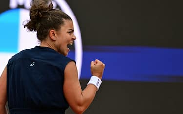 Italy's Jasmine Paolini reacts during her women's singles final match against USA's Coco Gauff during the WTA Rome Open tennis tournament at Foro Italico in Rome on May 17, 2025. (Photo by Tiziana FABI / AFP)