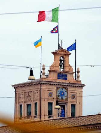 The flag of Ukraine hoisted on the Quirinal tower on the occasion of the visit of President Volodymyr Zelensky, Rome, Italy, 13 May 2023. ANSA/FABIO CIMAGLIA