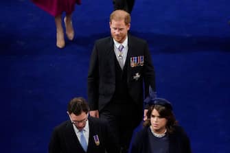 Britain's Prince Harry, Duke of Sussex arrives at Westminster Abbey in central London on May 6, 2023, ahead of the coronations of Britain's King Charles III and Britain's Camilla, Queen Consort. - The set-piece coronation is the first in Britain in 70 years, and only the second in history to be televised. Charles will be the 40th reigning monarch to be crowned at the central London church since King William I in 1066. Outside the UK, he is also king of 14 other Commonwealth countries, including Australia, Canada and New Zealand. Camilla, his second wife, will be crowned queen alongside him, and be known as Queen Camilla after the ceremony. (Photo by Andrew Matthews / POOL / AFP) (Photo by ANDREW MATTHEWS/POOL/AFP via Getty Images)