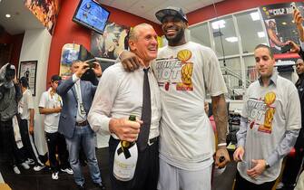 MIAMI, FL - JUNE 20: LeBron James #6 of the Miami Heat celebrates with team President Pat Riley in the locker room following the Heat's victory against the San Antonio Spurs in Game Seven of the 2013 NBA Finals on June 20, 2013 at American Airlines Arena in Miami, Florida. NOTE TO USER: User expressly acknowledges and agrees that, by downloading and or using this photograph, User is consenting to the terms and conditions of the Getty Images License Agreement. Mandatory Copyright Notice: Copyright 2013 NBAE (Photo by Jesse D. Garrabrant/NBAE via Getty Images)