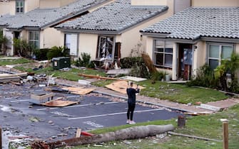 A woman photographs damage at the Bay House Condominiums on Monday, Aug. 28, 2017 in Rockport, Texas. Hurricane Harvey caused tremendous damage to the property.
(Rachel Denny Clow/Corpus Christi Caller-Times/TNS/Sipa USA)