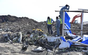 epa07484136 (FILE) - Rescue workers search the site for pieces of the wreckage of an Ethiopia Airlines Boeing 737 Max 8 aircraft near Bishoftu, Ethiopia, 13 March 2019. Ethiopian Airlines flight ET 302 carrying 149 passengers and 8 crew was en route to Nairobi, Kenya, when it crashed on 10 March 2019. All passengers and crew aboard died in the crash. Media reports on 04 April 2019 state that the preliminary report into the crash of an Ethiopian Airlines plane ET 302 last month says the aircraft nose dived several times before it crashed. Ethiopian Airlines state the preliminary report clearly showed that the Ethiopian Airlines Pilots who were commanding Fligh tET 302 /on 10 March have followed the Boeing recommended and FAA approved emergency procedures to handle the most difficult emergency situation created on the airplane. Despite their hard work and full  compliance with the emergency procedures, it was very unfortunate that they could not recover the airplane from the persistence of nose diving. As the investigation continues with more detailed analysis, as usual we will continue with our full cooperation with the investigation team.  EPA/STRINGER