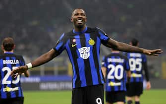 Inter Milan s Marcus Thuram jubilates  after scoring goal of 3 to 0 during the Italian serie A soccer match between Fc Inter  and Udinese Giuseppe Meazza stadium in Milan, 9  December 2023.
ANSA / MATTEO BAZZI