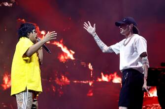 INDIO, CALIFORNIA - APRIL 19: (FOR EDITORIAL USE ONLY) (L-R) Chencho Corleone performs with Peso Pluma at the Coachella Stage during the 2024 Coachella Valley Music and Arts Festival at Empire Polo Club on April 19, 2024 in Indio, California. (Photo by Frazer Harrison/Getty Images for Coachella)