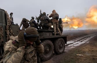 epa11036445 Ukrainian servicemen of 228 Separate Battalion of the 127th Separate Territorial Defence Brigade shoot the anti-aircraft artillery complex S-60 from their position on a frontline in Zaporizhzhia area, Ukraine, 18 December 2023. Russian troops entered Ukrainian territory in February 2022, starting a conflict that has provoked destruction and a humanitarian crisis.  EPA/YAKIV LIASHENKO