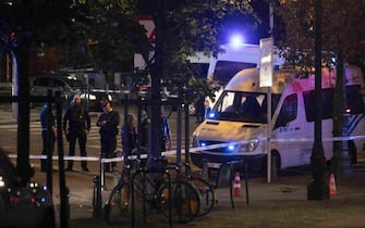 This photograph shows the police perimeter at the site of a shooting incident in the Ieperlaan - Boulevard d'Ypres, in Brussels, on October 16, 2023. Two people were killed during a shooting in Brussels on October 16, 2023 evening and the suspect was on the run, the Belgian capital's prosecutor's office said. (Photo by HATIM KAGHAT / Belga / AFP) / Belgium OUT (Photo by HATIM KAGHAT/Belga/AFP via Getty Images)