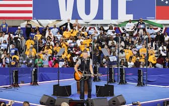 epa11681855 Musician Bruce Springsteen performs during a campaign rally for Democratic presidential candidate US Vice President Kamala Harris at the James R. Hallford Stadium in Clarkston, Georgia, USA, 24 October 2024. Harris is running against former US president and Republican presidential nominee Donald Trump and the United States will hold its election on 05 November 2024.  EPA/ERIK S. LESSER