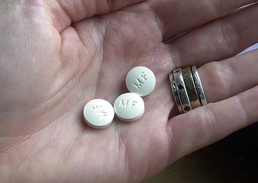 382724 01: Three RU-486 Mifeprex abortion pills are held in a hand December 1, 2000 in Granite City, Illinois. The Hope Center for Women is the first area abortion clinic to distribute the new pills that terminates a pregnancy. The RU-486 pill was approved in September and can be taken by women up to the seventh week of pregnancy. The drug blocks the hormone that sustains the embryo and then unhooks it from the uterine wall. (Photo by Bill Grenblatt/Liaison)