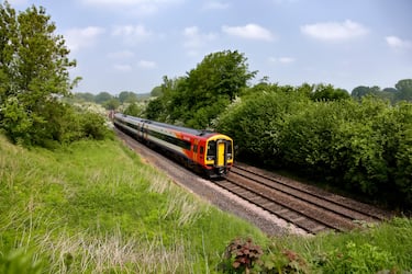 British Rail Class 159 DMU train in South West Trains Livery passes Sherrington in Wiltshire as it heads towards Warminster, UK.