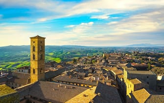Tuscany, Volterra town aerial view, church tower and panorama view on sunset. Maremma, Italy, Europe