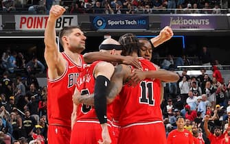 INDIANAPOLIS, IN - MARCH 13:  Nikola Vucevic #9 of the Chicago Bulls Ayo Dosunmu #12 of the Chicago Bulls Alex Caruso #6 of the Chicago Bulls & DeMar DeRozan #11 of the Chicago Bulls embrace after the game on March 13, 2024 at Gainbridge Fieldhouse in Indianapolis, Indiana. NOTE TO USER: User expressly acknowledges and agrees that, by downloading and or using this Photograph, user is consenting to the terms and conditions of the Getty Images License Agreement. Mandatory Copyright Notice: Copyright 2024 NBAE (Photo by Ron Hoskins/NBAE via Getty Images)