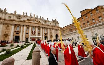 Cardinals and bishops during the mass on Palm Sunday in St. Peter's Square at The Vatican, 13 April 2025. ANSA/FABIO FRUSTACI 
