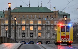An ambulance drives over a bridge towards the Charles University in central Prague, on December 21, 2023. Czech police said a shooting in a university building in central Prague has left "dead and wounded people", without providing further details.
"Based on the initial information we have, we can confirm dead and wounded people on the scene," police said on X, formerly Twitter. Czech media said the shooting had occurred at the Faculty of Arts whose teachers and students were instructed to lock themselves up as the police action was under way. (Photo by Michal CIZEK / AFP) (Photo by MICHAL CIZEK/AFP via Getty Images)