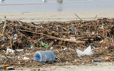 HUNTINGTON BEACH, CA - FEBRUARY 27: The pile of trash and debris on the beach that washed down the Santa Ana River in Huntington Beach on Monday, February 27, 2023 after the recent rain storms that hit Southern California.  (Photo by Leonard Ortiz/MediaNews Group/Orange County Register via Getty Images)