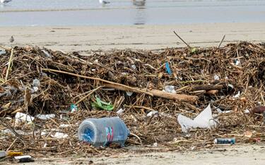 HUNTINGTON BEACH, CA - FEBRUARY 27: The pile of trash and debris on the beach that washed down the Santa Ana River in Huntington Beach on Monday, February 27, 2023 after the recent rain storms that hit Southern California.  (Photo by Leonard Ortiz/MediaNews Group/Orange County Register via Getty Images)