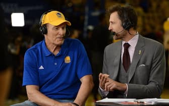 Golden State Warriors legend Rick Barry, left, is interviewed by, among others, his son Brent Barry, center, before Game 5 of the NBA Finals against the Cleveland Cavaliers at Oracle Arena in Oakland, Calif., on Sunday, June 14, 2015. (Dan Honda/Bay Area News Group)