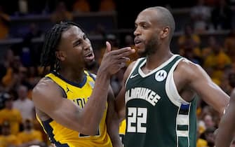 INDIANAPOLIS, INDIANA - APRIL 26: Aaron Nesmith #23 of the Indiana Pacers confronts Khris Middleton #22 and Patrick Beverley #21 of the Milwaukee Bucks in the fourth quarter during game three of the Eastern Conference First Round Playoffs at Gainbridge Fieldhouse on April 26, 2024 in Indianapolis, Indiana. NOTE TO USER: User expressly acknowledges and agrees that, by downloading and or using this photograph, User is consenting to the terms and conditions of the Getty Images License Agreement. (Photo by Dylan Buell/Getty Images)