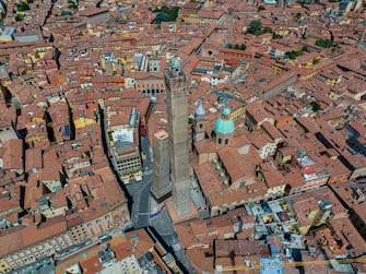 Step into the rich history of Bologna through this captivating aerial view. The skyline is a testament to the city's layered past, featuring a variety of rooftops, ancient structures, and imposing medieval towers. This bird's-eye perspective offers a unique and comprehensive look at Bologna's architectural tapestry, making it an ideal representation of the city's storied heritage.
