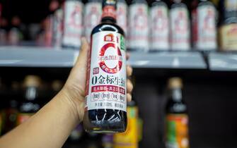 SHAOXING, CHINA - OCTOBER 02: Bottles of soy sauce produced by Foshan Haitian Flavoring & Food Co., Ltd are displayed for sale at a supermarket on October 2, 2022 in Shaoxing, Zhejiang Province of China. (Photo by VCG/VCG via Getty Images)