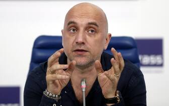 epa05806601 Russian writer Zakhar Prilepin attends a news conference for the presentation of his new book 'Platoon' in Moscow, Russia, 21 February 2017.  EPA/MAXIM SHIPENKOV