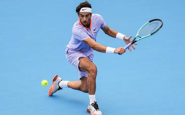 BEIJING, CHINA - SEPTEMBER 27: Lorenzo Musetti of Italy plays a backhand in the Men's Singles First Round against Zizou Bergs of Belgium during day five of the 2024 China Open at National Tennis Center on September 27, 2024 in Beijing, China. (Photo by Shi Tang/Getty Images)