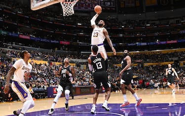 LOS ANGELES, CA - JANUARY 7: LeBron James #23 of the Los Angeles Lakers dunks the ball during the game against the LA Clippers on January 7, 2024 at Crypto.Com Arena in Los Angeles, California. NOTE TO USER: User expressly acknowledges and agrees that, by downloading and/or using this Photograph, user is consenting to the terms and conditions of the Getty Images License Agreement. Mandatory Copyright Notice: Copyright 2024 NBAE (Photo by Andrew D. Bernstein/NBAE via Getty Images) 
