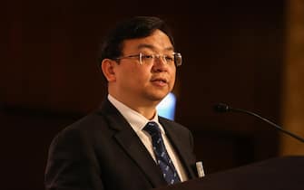 Wang Chuanfu, founder and chairman of BYD Co., speaks during a news conference in Hong Kong, China, on Wednesday, March 28, 2018. Shares of BYD Co. plunged the most in two years after Chinas biggest maker of electric cars predicted a decline of as much as 92 percent in first-quarter earnings, citing decreased government subsidies on new-energy vehicles. Photographer: Billy H.C. Kwok/Bloomberg via Getty Images