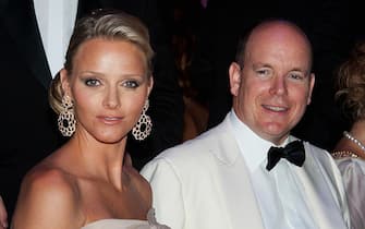 MONTE-CARLO, MONACO - JULY 30:  Prince Albert II of Monaco and his fiancee Charlene Wittstock attend the 62nd Monaco Red Cross Ball at the Sporting Club Monte Carlo on July 30, 2010 in Monte Carlo, Monaco.  (Photo by Pool/Getty Images)