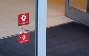 Milan, italy - 06 15 2022 : Satispay S.p.A logo brand and text sign Italian company mobile application for digital payment and money transfer web net