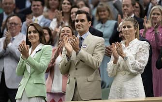 LONDON, ENGLAND - JULY 04: Catherine, Princess of Wales, former Wimbledon Champion, Roger Federer of Switzerland and his wife Mirka Federer applaud from the royal box following the men's singles first round match between Andy Murray of Great Britain and Ryan Peniston of Great Britain during day two of The Championships Wimbledon 2023 at All England Lawn Tennis and Croquet Club on July 04, 2023 in London, England. (Photo by Visionhaus/Getty Images)