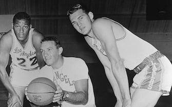 (Original Caption) Left to right: Elgin Baylor, Coach Fred Schaus and Jerry West of the Los Angeles Lakers.