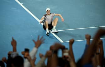 epa11110347 Jannik Sinner of Italy celebrates after winning  the Men s Singles final against Daniil Medvedev of Russia on Day 15 of the Australian Open tennis tournament in Melbourne, Australia, 28 January 2024.  EPA/JAMES ROSS AUSTRALIA AND NEW ZEALAND OUT