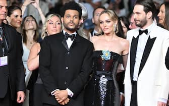 CANNES, FRANCE - MAY 22: Abel “The Weeknd” Tesfaye, Lily-Rose Depp and Sam Levinson attend the "The Idol" red carpet during the 76th annual Cannes film festival at Palais des Festivals on May 22, 2023 in Cannes, France. (Photo by Stephane Cardinale - Corbis/Corbis via Getty Images)