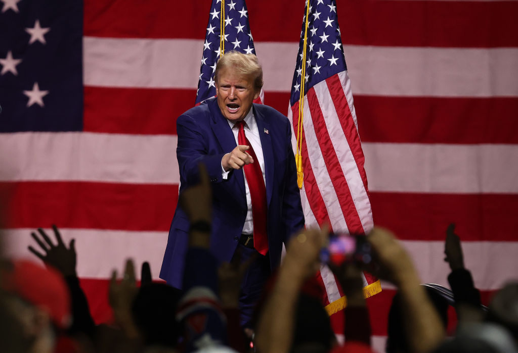 RENO, NEVADA - DECEMBER 17: Republican Presidential candidate former U.S. President Donald Trump delivers remarks during a campaign rally at the Reno-Sparks Convention Center on December 17, 2023 in Reno, Nevada. Former U.S. President Trump held a campaign rally as he battles to become the Republican Presidential nominee for the 2024 Presidential election.  (Photo by Justin Sullivan/Getty Images)