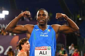 ROME, ITALY - JUNE 08: Silver medalist, Chituru Ali of Team Italy, poses for a photo after finishing second in in the Men's 100 Metres Final on day two of the 26th European Athletics Championships - Rome 2024 at Stadio Olimpico on June 08, 2024 in Rome, Italy.  (Photo by Mattia Ozbot/Getty Images for European Athletics)