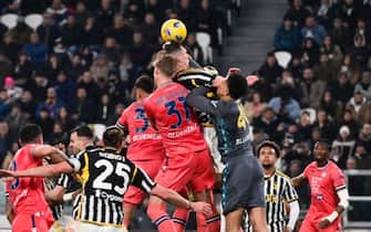 TURIN, ITALY - FEBRUARY 12: (L-R) Maduka Okoye of Udinese Calcio,Thomas Kristensen of Udinese Calcio against Arkadiusz Milik of Juventus FCduring the Serie A TIM match between Juventus and Udinese Calcio - Serie A TIM  at  on February 12, 2024 in Turin, Italy. (Photo by Stefano Guidi/Getty Images)