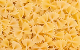 Italian Farfalle Pasta raw food background or texture close up