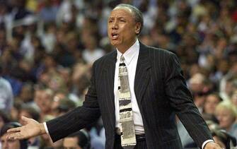 ATLANTA, UNITED STATES:  Atlanta Hawks Head Coach Lenny Wilkens pleads his case with the officals 18 May, 1999, during the second half of game one of his teams NBA Eastern Conference semi-finals game against the New York Knicks at the Georgia Dome in Atlanta, Georgia.  (ELECTRONIC IMAGE)  AFP PHOTO/Jeff HAYNES (Photo credit should read JEFF HAYNES/AFP via Getty Images)