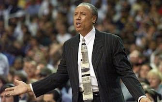 ATLANTA, UNITED STATES:  Atlanta Hawks Head Coach Lenny Wilkens pleads his case with the officals 18 May, 1999, during the second half of game one of his teams NBA Eastern Conference semi-finals game against the New York Knicks at the Georgia Dome in Atlanta, Georgia.  (ELECTRONIC IMAGE)  AFP PHOTO/Jeff HAYNES (Photo credit should read JEFF HAYNES/AFP via Getty Images)