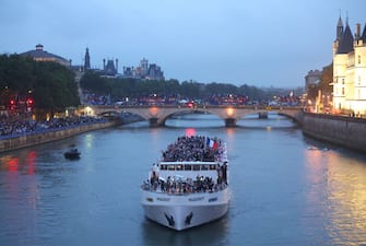 PARIS, FRANCE - JULY 26: Athletes of Team France cruise during the athletesâ   parade on the River Seine during the opening ceremony of the Olympic Games Paris 2024 on July 26, 2024 in Paris, France. (Photo by Maddie Meyer/Getty Images)