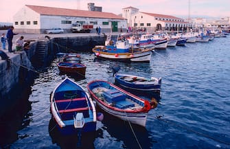 Harbour, fishing boats, fishermen, Tarifa, Province of Cadiz, Andalusia Spain. (Photo by: Dukas/Universal Images Group via Getty Images)