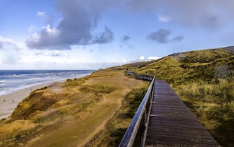 A wooden road on the Red Cliff near the beach in Sylt, Germany